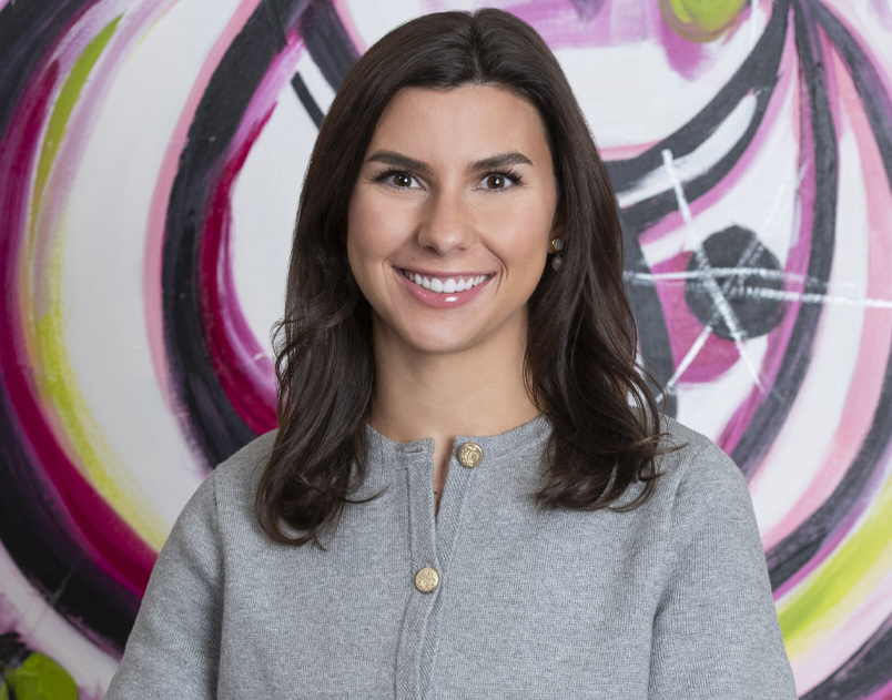 a woman smiling for the camera
